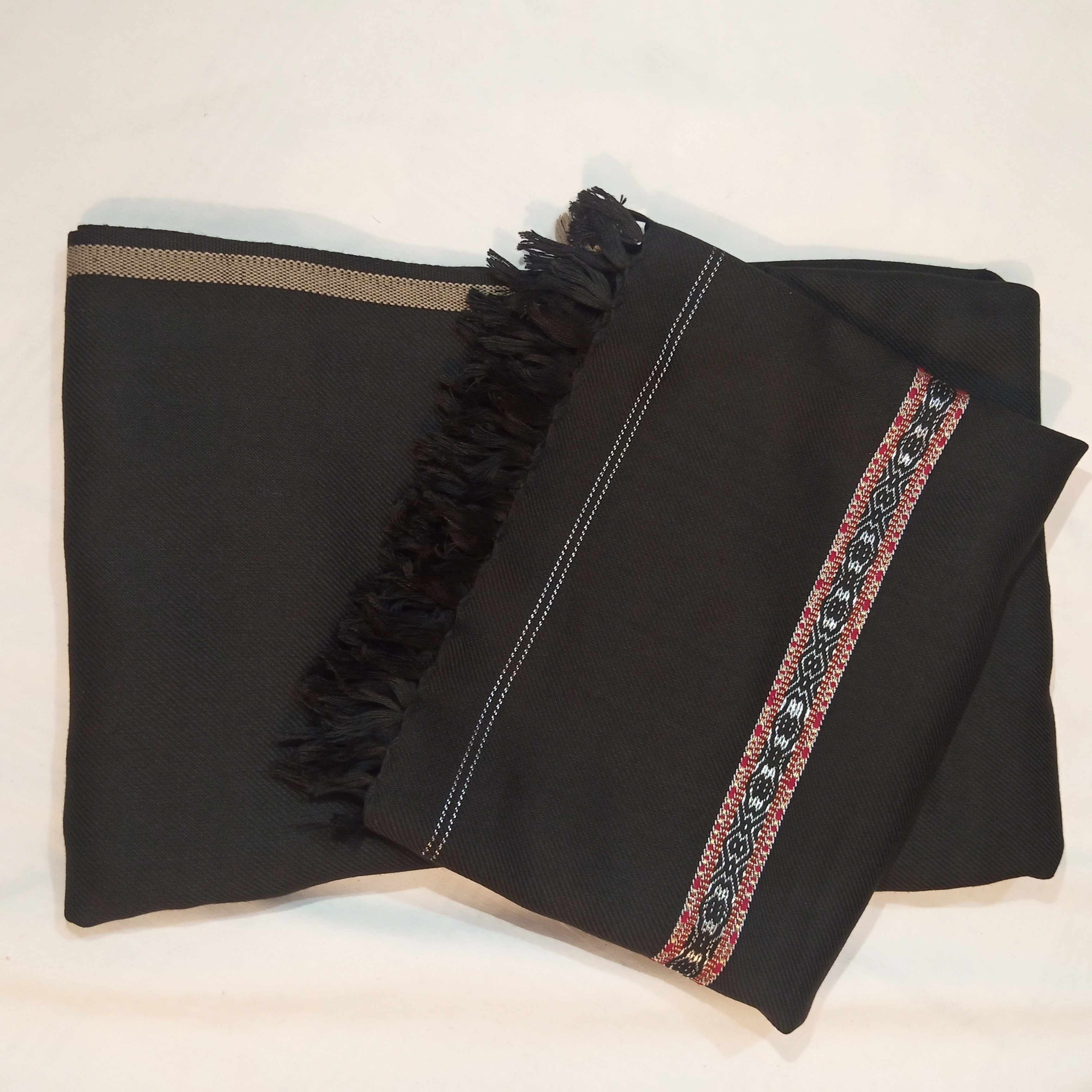 First image of woollen black shawl.