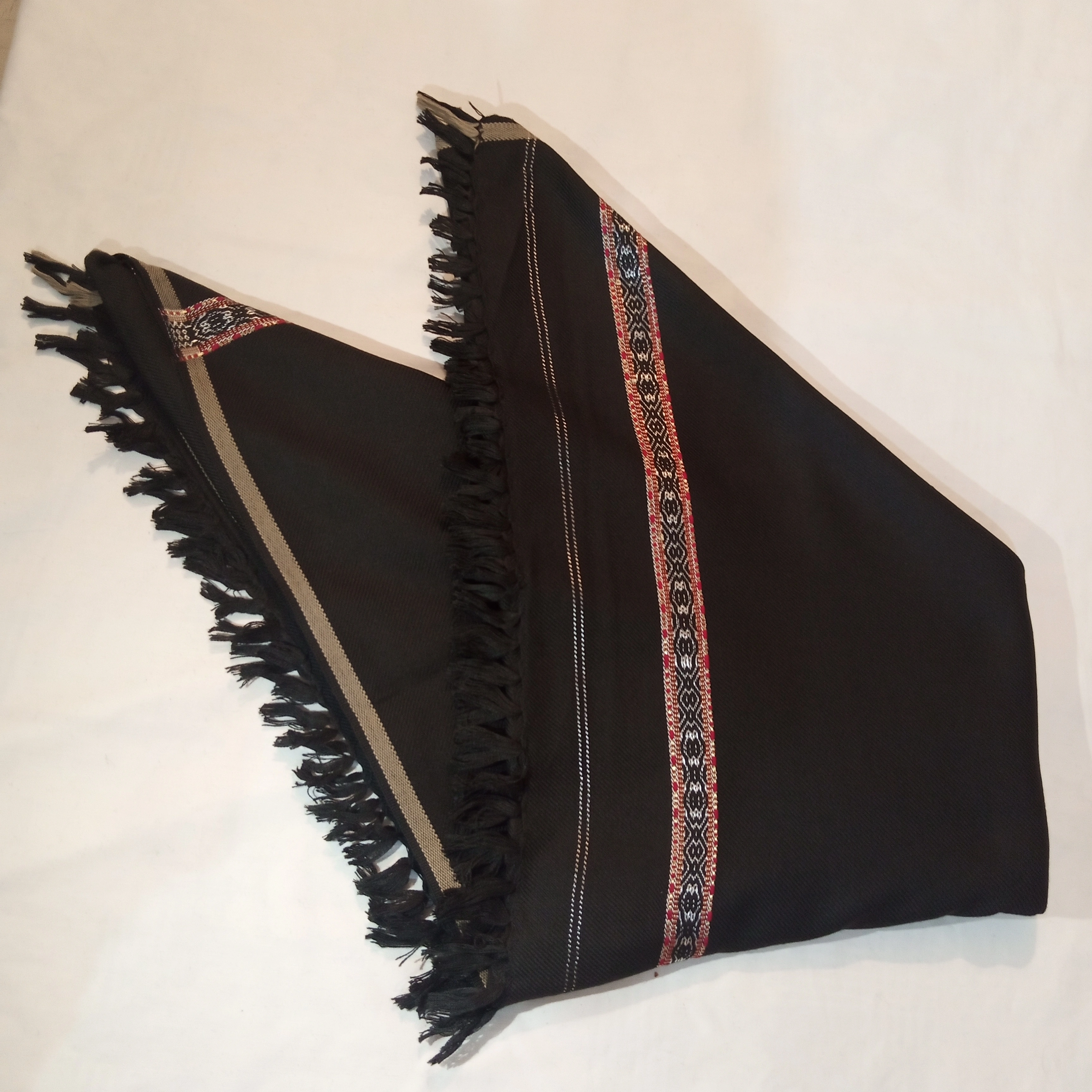 second image of woollen black shawl.
