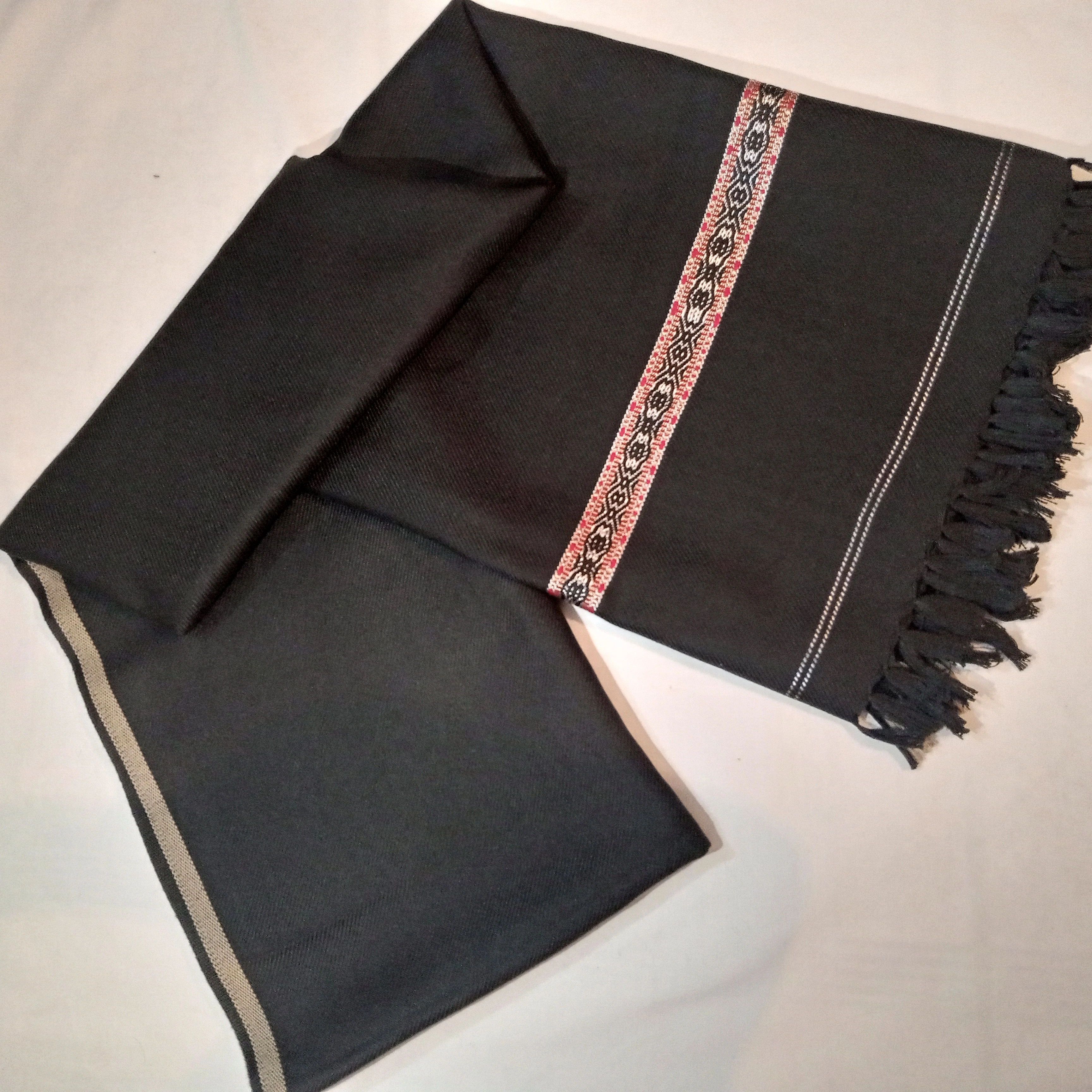 Fifth image of woollen black shawl.